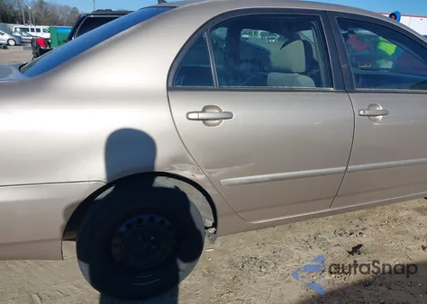 2005 Toyota Corolla Le from USA, damaged, VIN 2T1BR32E15C396526